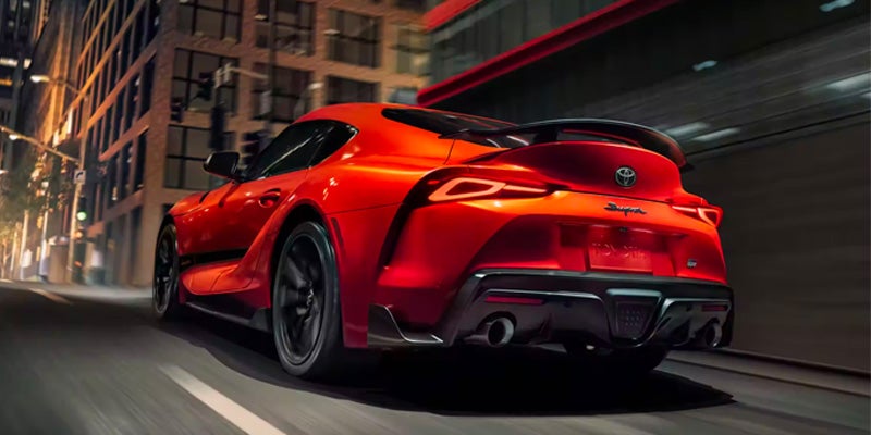 2024 Toyota Red Supra speeding through the streets of Pocatello, ID